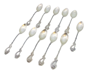 Silver Teaspoons with Reliefs and Shell Handles, Set of 11