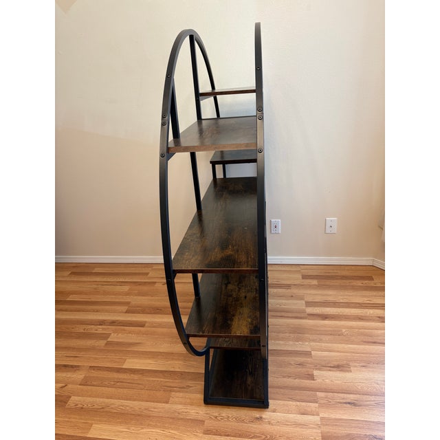 What I love most about the etegrere' is there are 7 shelves to display items and plenty of places you can hook items on...