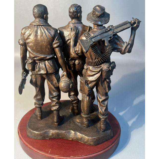 Frederick Hart (1943-1999) artist and sculptor designed this "Three Soldiers bronze sculpture," realistic in style, for...