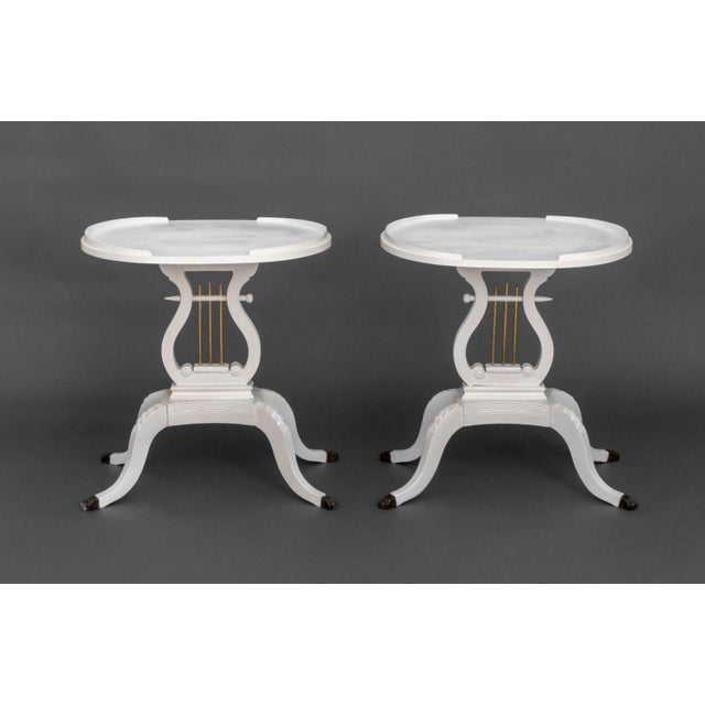 Pair of Federal Style White Painted Harp Side Tables, with harp form bases on four paw form brass feet. 26.5" H x 24.5" W...