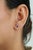 These handmade stud earrings feature 0.66 carats of natural rubies, set in 18K white gold. Each ruby measuring...