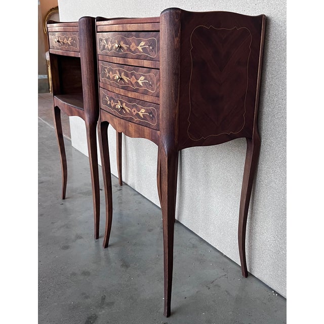 A pretty pair of French, inlaid kingwood, one drawer nightstands with tray accents, circa 1930. Pair of French Louis XV...