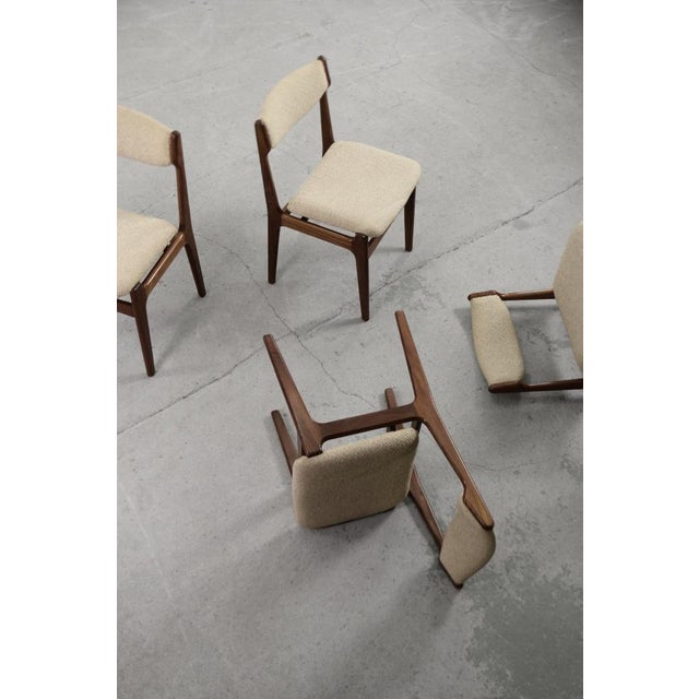 This set of four elegant chairs was produced in Denmark during the 1960s. They are made of solid teak wood in a dark shade...