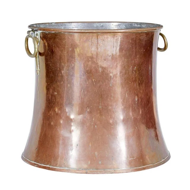 19th century shaped copper and brass log bin circa 1870. Good quality copper storage bin which is shaped like an elephants...