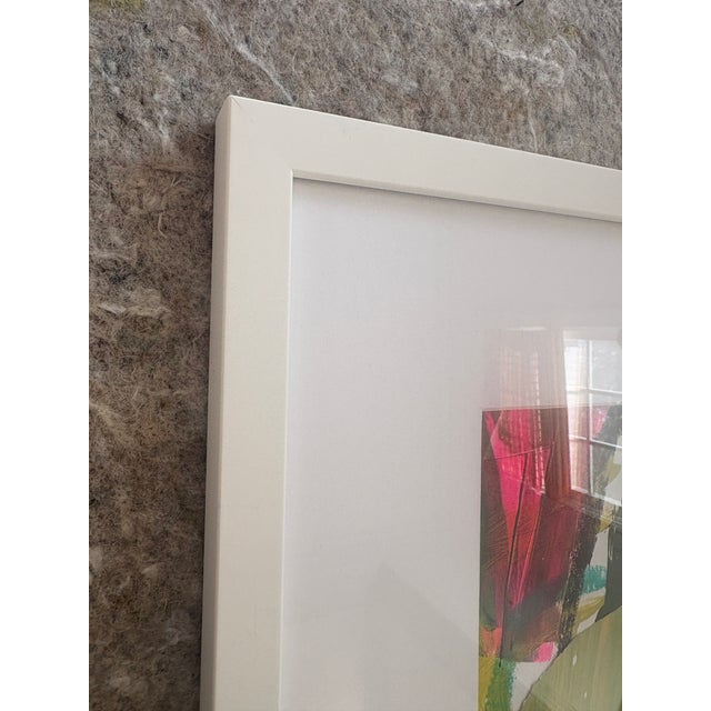 Acrylic and mixed media collage on paper, framed in a white wood frame with a bevel cut mat. Full frame dimensions measure...