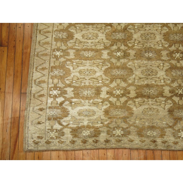 A Vintage Turkish rug in shades of brown. 6'2'' x 9'5''