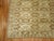 A Vintage Turkish rug in shades of brown. 6'2'' x 9'5''