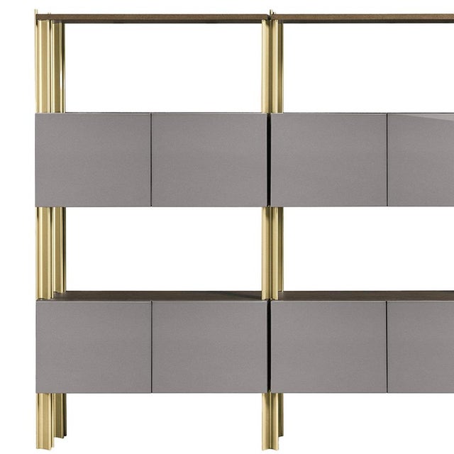 A striking interplay of structure and volume defines this bookshelf by Robert Stadler, where a slender extruded aluminum...