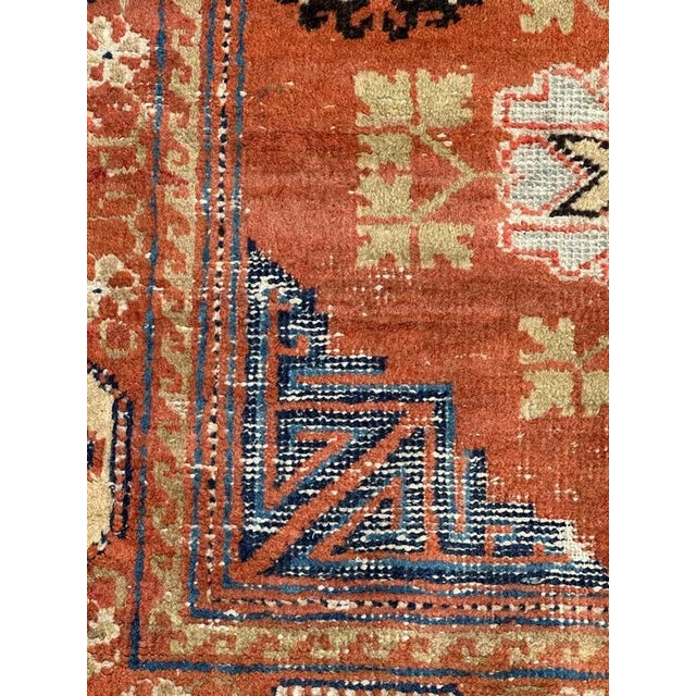 Nice antique chinese rug, with a beautiful antique Chinese design, and nice colours with a orange background, entirely...