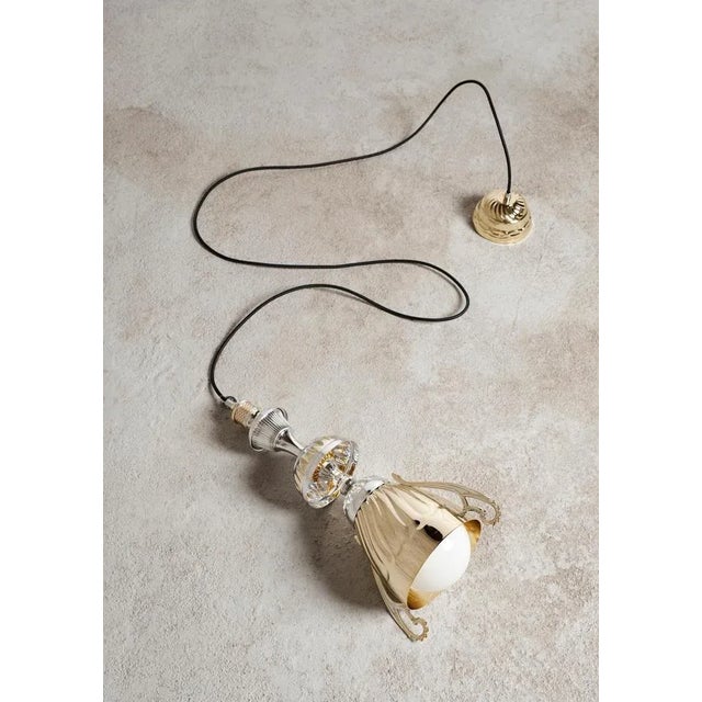 Gold, Silver L5 Light by Flétta Dimensions: 47 x 4 cm Materials: silver, gold Trophy is a collection of tables, lights,...