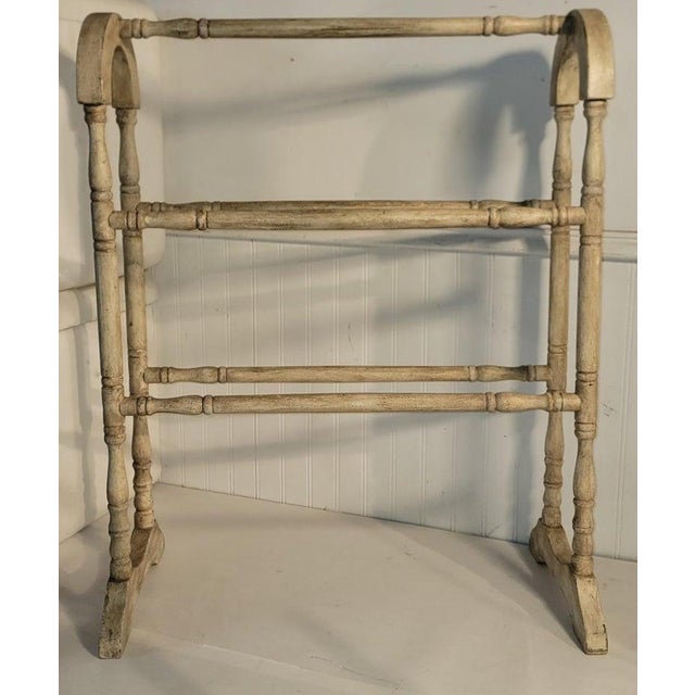 This 19thc Original cream painted quilt rack is in fine sturdy condition.Found in Pennsylvania.