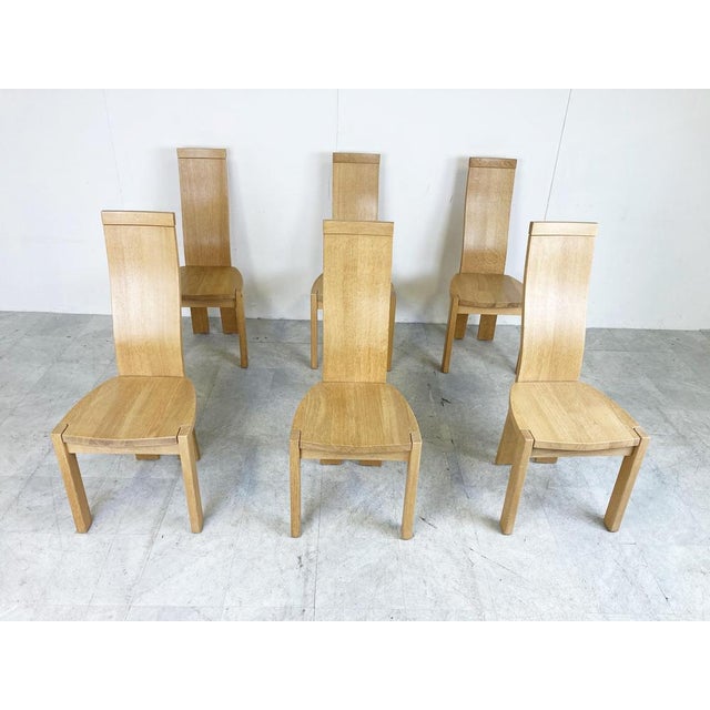 Elegant, sculptural high back dining chairs by Vanden Berghe Pauvers. Very good condition. Dimensions: Height:...
