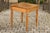An Italian walnut neoclassical period side table from circa 1820, with single drawer and tapered legs. Born in Italy...