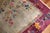 Stunning large Chinese Art Deco rug with a beautiful floral design with a silver field and plum border. Room size formats...