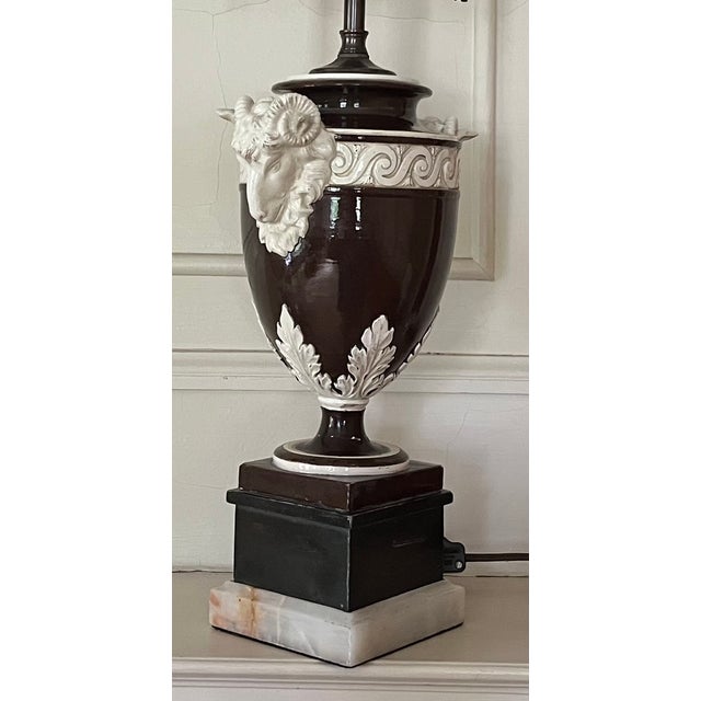 Fine antique 19th century Italian creamware urn with goat mask handles mounted as a table lamp. Handsome chocolate brown...