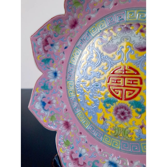 Chinese porcelain Famille Rose dragon bowl, a finely formed,shallow bowl,with a finely formed rim of eight, lotus flower...