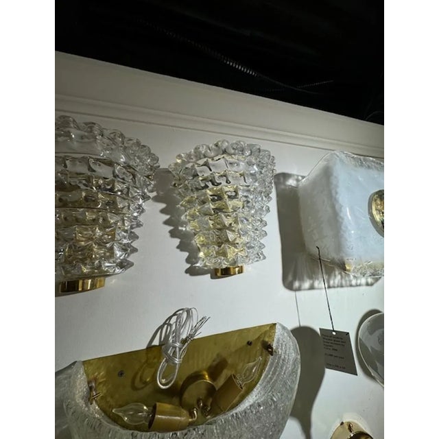 Lovely pair of modern Rostrada Murano glass and brass sconces. Creates an elegant look!! Note: Three pairs available. 9h x...