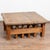20th century rustic square coffee table from Hungary. The base is uniquely constructed using old vice elements, creating...