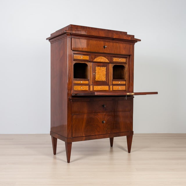 An elegant 19th century secretary desk crafted in mahogany and professionally restored to a high standard. The front is...