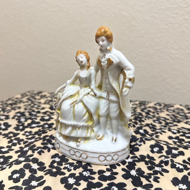 For your Chairish listing, this item is a Vintage Mid-Century Porcelain Figural Courting Couple. These figurines were...