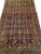 Early 20th Century Vintage Persian Senneh Area Rug, meticulously hand-knotted circa the early 1900s. This captivating area...