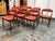 Design Plus Gallery presents a Set of Eight Mid Century Mobler Dining Chairs from Kai Kristiansen. This set showcases...