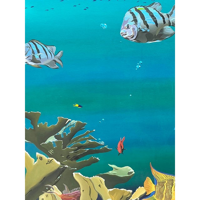 This monumental triptych by artist Paul Youngblood is a breathtaking homage to the vibrant life of a tropical coral reef....