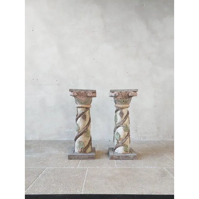 Pair of antique carved wooden pedestals.Italian column parts made into plinths. Beautifully carved wooden details with...