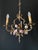 The chandelier is made of bronze and features exquisite artistic forging. It is adorned with handmade porcelain roses and...
