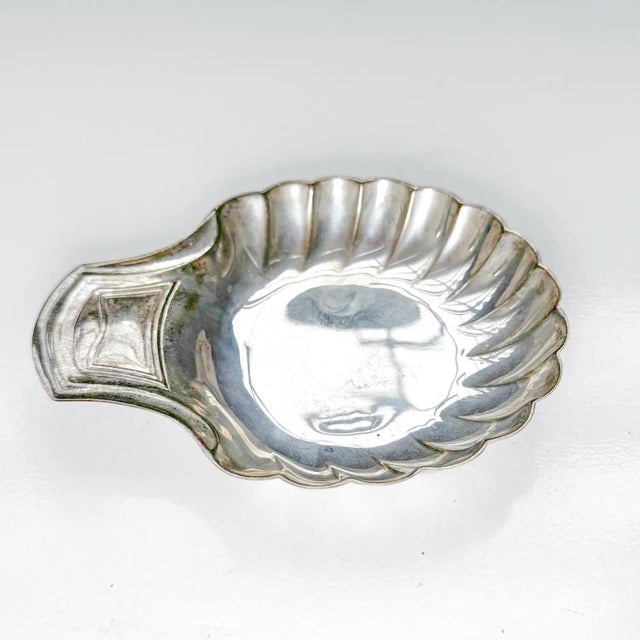 Authentic Christofle France solid sterling silver shell dish • Features a scalloped edge and paneled handle, ideal for...