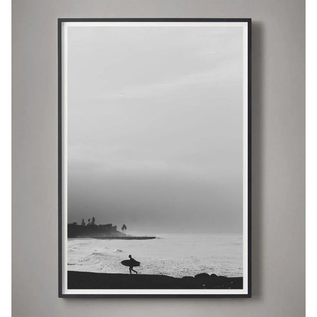 Photographer Mo Gambill captures a lone surfer among the coastal fog of Southern California. Unframed photograph printed...