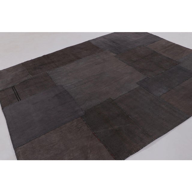 Handwoven in hemp, this 8x10 vintage Turkish patchwork rug, circa 1950–1960, is a sophisticated addition to Rug & Kilim’s...