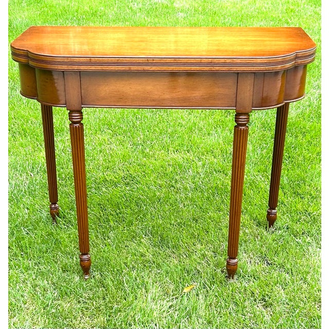 Baker Furniture Company Biggs Furniture, Mahogany, Sheraton Style, Swivel and Hinged Flip Top Mechanism, Game Table, W/Hidden Drawer, Scalloped Edges, and Fluted Legs, 1950 For Sale - Image 4 of 12