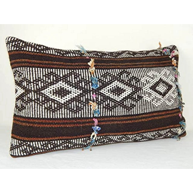 This handwoven kilim pillow is made from Anatolia and Middleast Kilim fragments. Each of our kilim pillow cover is cut...