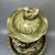 Magnificent Chinese celadon lidded vase, featuring striking three‑dimensional dragon relief winding around the neck. The...