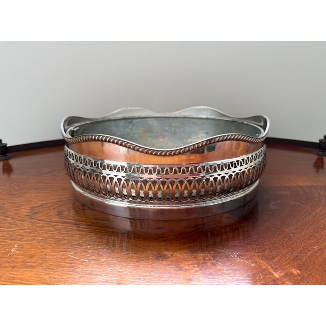For your dining table, sideboard, or coffee table, a beautiful antique silver plated centerpiece basket with removeable...