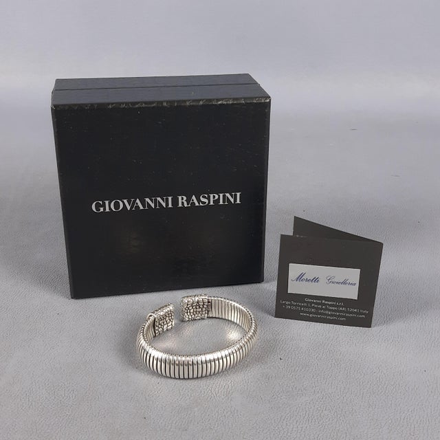 We offer for sale an iconic piece from the tuscan fashion house giovanni raspini, a piece that perfectly embodies the bold...