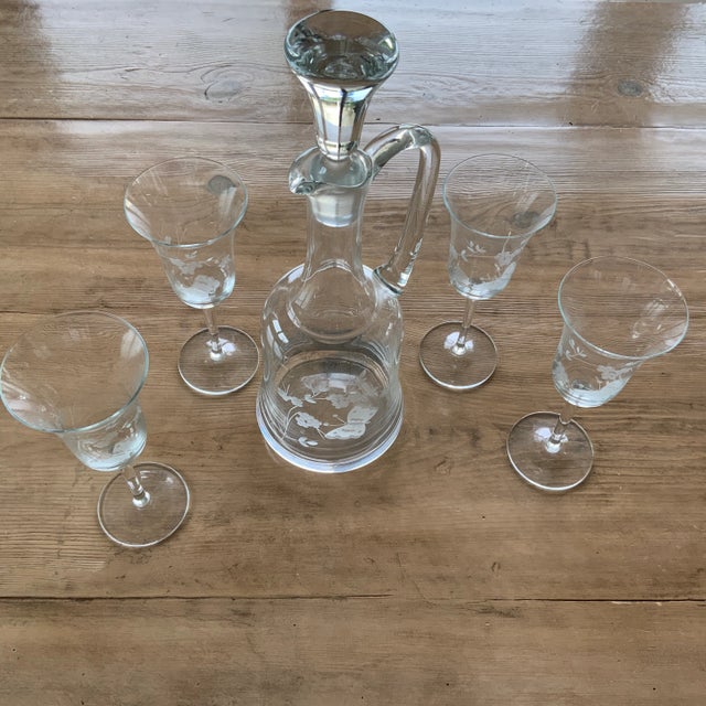 Simply elegant and delicate, this decanter and wineglass set features an etched butterfly and grapevine motif. Each piece...