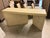Design Plus Gallery presents a Contemporary Geometric Faux Stone Console Table. This architectural design showcases an...