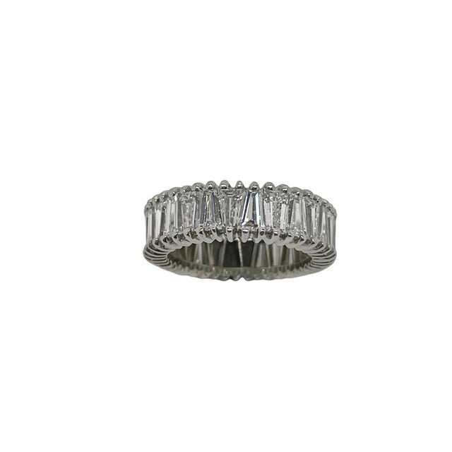 This unique eternity bands is beautifully made with 28 top quality tapered baguette cut diamonds weighing approximately...