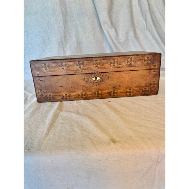This 19th Century English Walnut Tunbridge Ware Writing Box was crafted in the late 1800's. Tunbridge Ware is...
