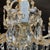 A 1950s maria teresa crystal living room chandelier, richly decorated with crystal pendants, features twelve curved arms...