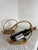 Pair of vintage rattan and bent wicker bottle holders, typical of the 1950s to 1970s. Their clean, organic design allows...