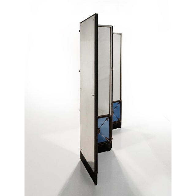 A rare and visually commanding four-panel Art Deco folding screen, showcasing a sophisticated interplay of materials and...