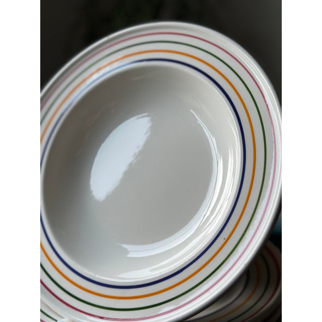 Bring a cheerful, retro Italian pop of color to your table with this vintage set of six (6) rimmed soup or pasta bowls by...