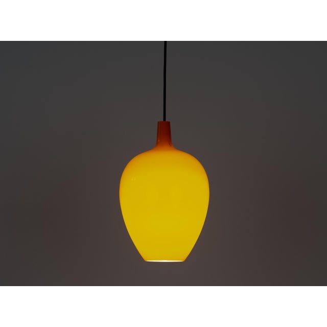 The Pompei pendant lamp, designed by renowned Danish designer Jo Hammerborg in 1963 for the renowned Fog & Mørup label, is...