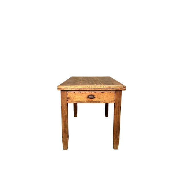 Poplar wood "book" table from the late 1800s with a drawer on the front.