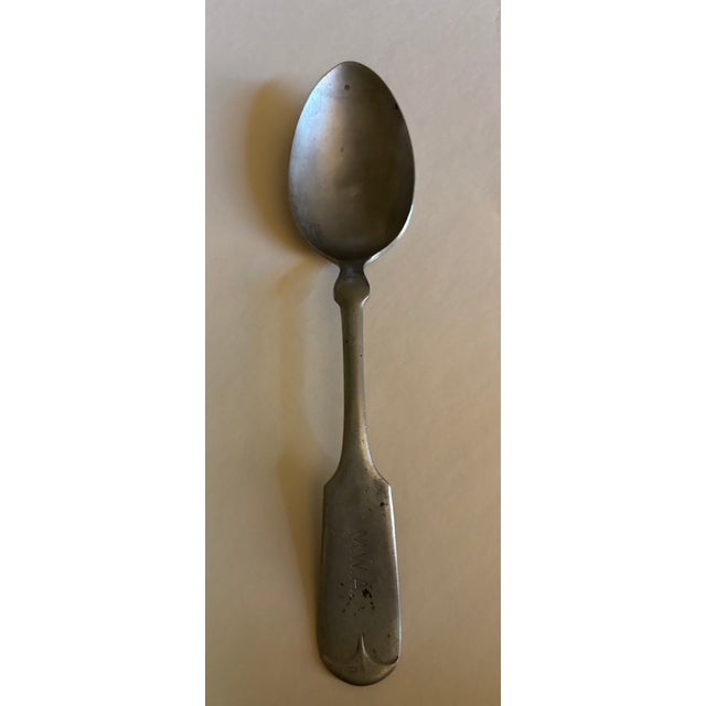 Group of seven coin silver Fiddleback spoons. Made in early to mid 1800s in USA. Made by melting down 90 % silver coins.