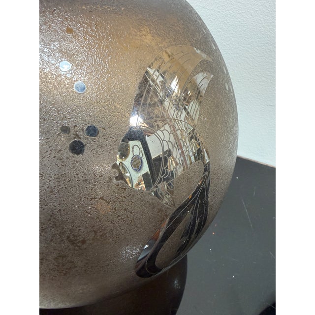 A beautifully atmospheric mid-century Italian vase crafted in smoky-toned Murano glass, distinguished by its soft, rounded...