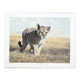 1983 Charles Fracé “Young Explorer, Lion Cub” Print For Sale